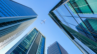Skyscrapers and airplane