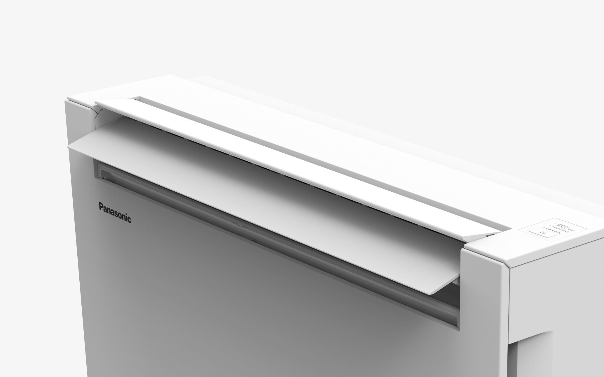 正面から見た白色の床置きエアコンの吹出口と操作部分