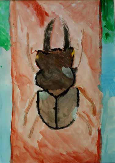 木に上るクワガタ