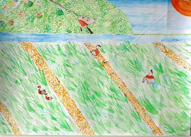 鳥を飛びかう田んぼ