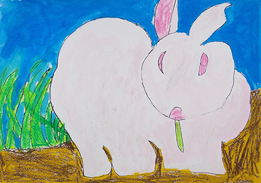 ウサギが草を食べている