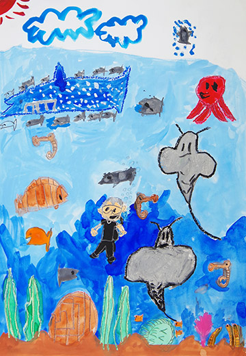 人間と大きい魚