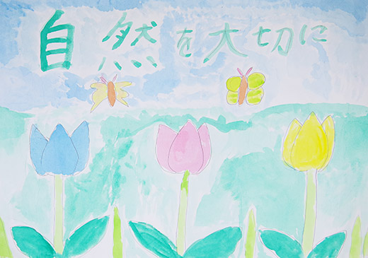 チューリップの上を飛ぶチョウチョ