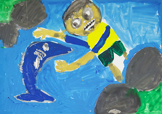 魚をつかまえようとしている人