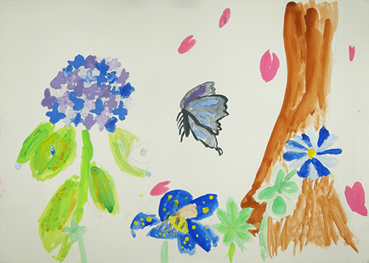 花のまわりにむらがるチョウとハチ