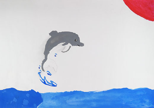 海でイルカがじゃんぷ