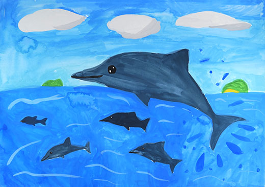 キレイな海でイルカがジャンプ！