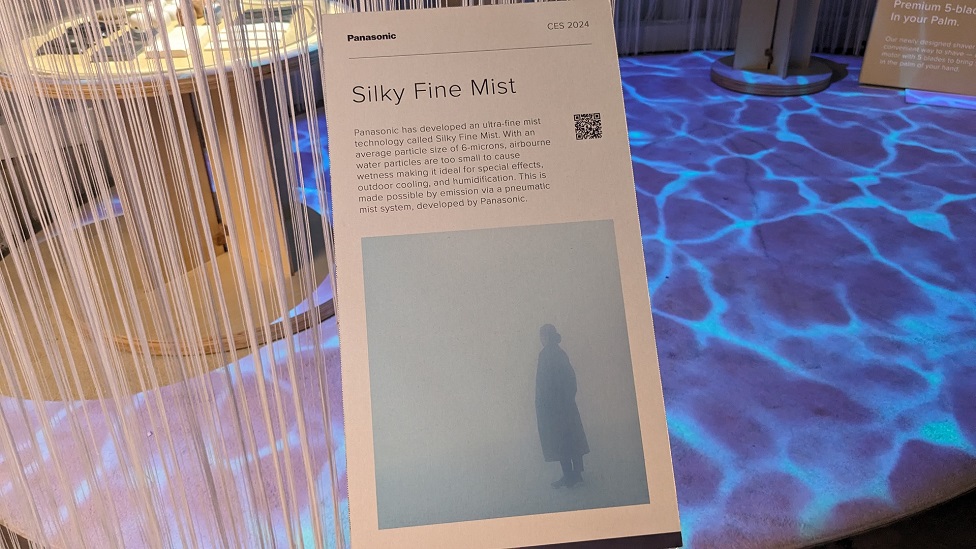 A poster is set up in an exhibition booth depicting the ocean.